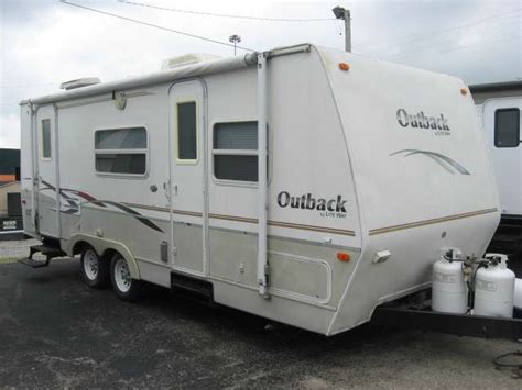 This trailer is all aluminum frame and smooth side fiberglass body construction. . 2002 outback trailer 25ft rv